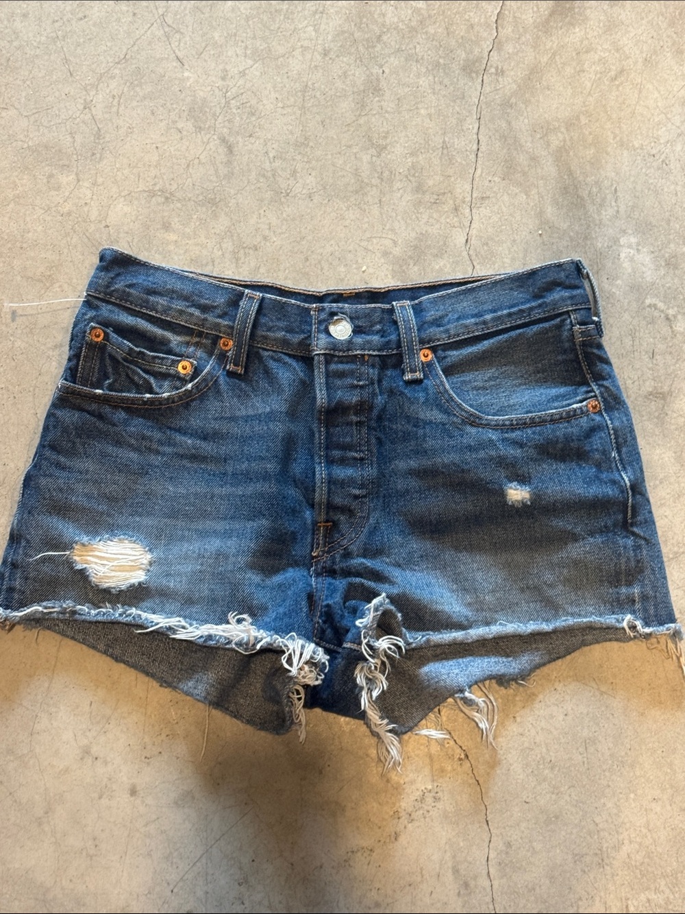 49. Levi's Dark Blue Distressed Denim Cutoff Shorts
